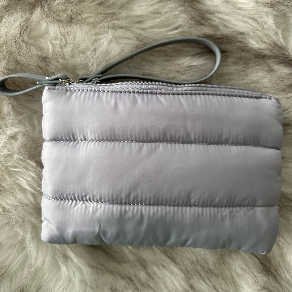 Double zip wristlet with card pockets inside